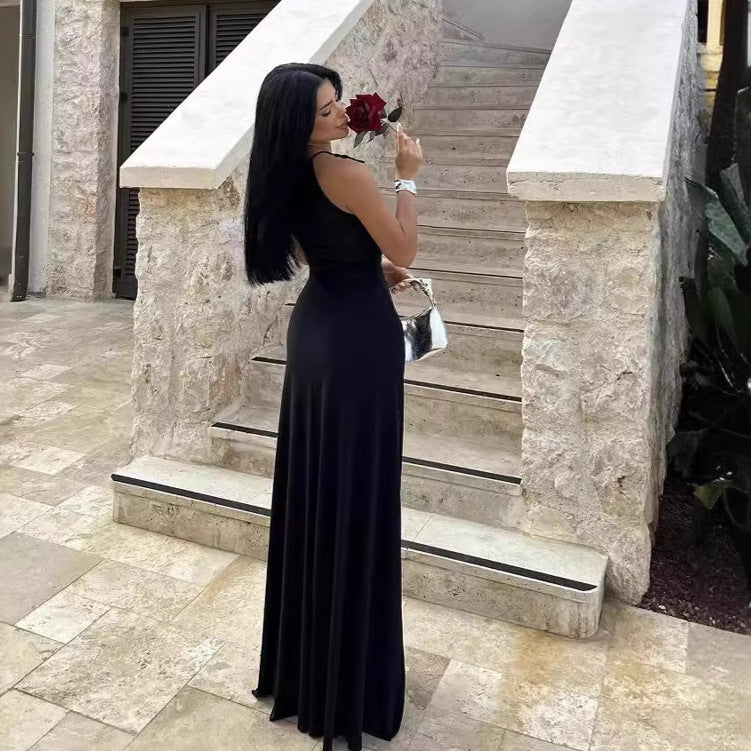 A Long Dress With A Pleated Design That Creates A Slimming Figure-flattering Look