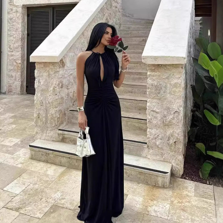 A Long Dress With A Pleated Design That Creates A Slimming Figure-flattering Look